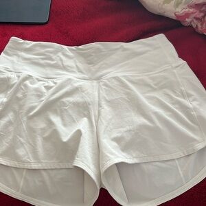 Like new lululemon off white shorts. Size 8. Worn twice.
